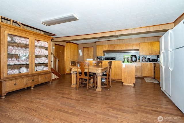 300 Brim Rd, Onalaska, WA 98570 - dining area with dark wood-type flooring and wood walls