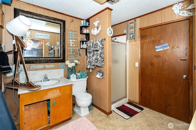 300 Brim Rd, Onalaska, WA 98570 - bathroom featuring wood walls, vanity, a shower stall, toilet, and ornamental molding