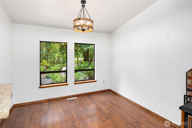 23611 Friar Creek Rd, Monroe, WA 98272 - unfurnished room with wood finished floors and baseboards