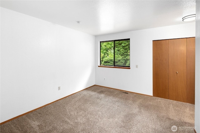 23611 Friar Creek Rd, Monroe, WA 98272 - unfurnished bedroom with carpet floors and a closet