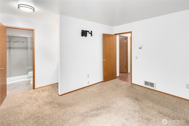 23611 Friar Creek Rd, Monroe, WA 98272 - unfurnished bedroom featuring carpet flooring and a walk in closet