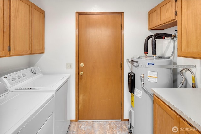 23611 Friar Creek Rd, Monroe, WA 98272 - washroom with cabinet space, electric water heater, and washer and dryer