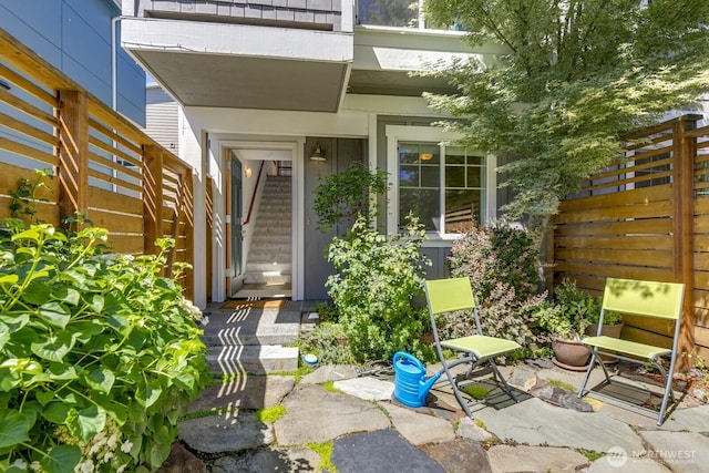 12046 33rd Ave NE Unit A, Seattle, WA 98125 - doorway to property with a patio area