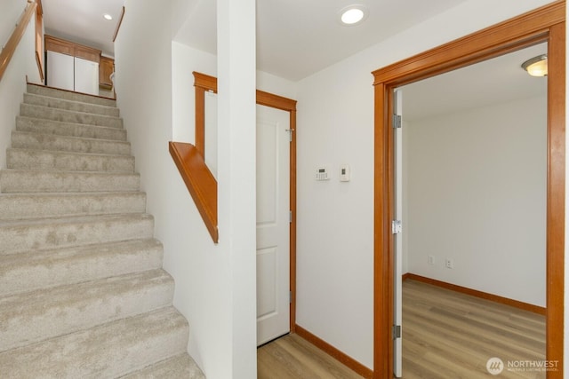12046 33rd Ave NE Unit A, Seattle, WA 98125 - staircase with wood finished floors, recessed lighting, and baseboards