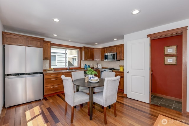 12046 33rd Ave NE Unit A, Seattle, WA 98125 - dining room with wood finished floors and recessed lighting