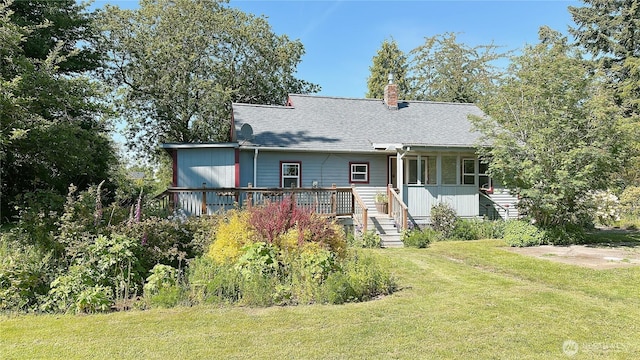 7459 Blaine Rd, Blaine, WA 98230 - view of front of property featuring a front yard, a chimney, and a shingled roof