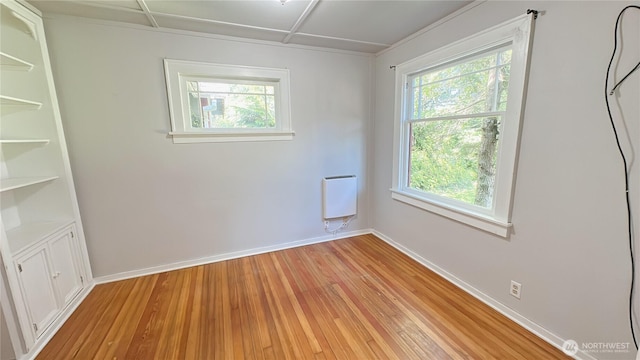 7459 Blaine Rd, Blaine, WA 98230 - unfurnished room featuring baseboards, light wood-type flooring, and heating unit