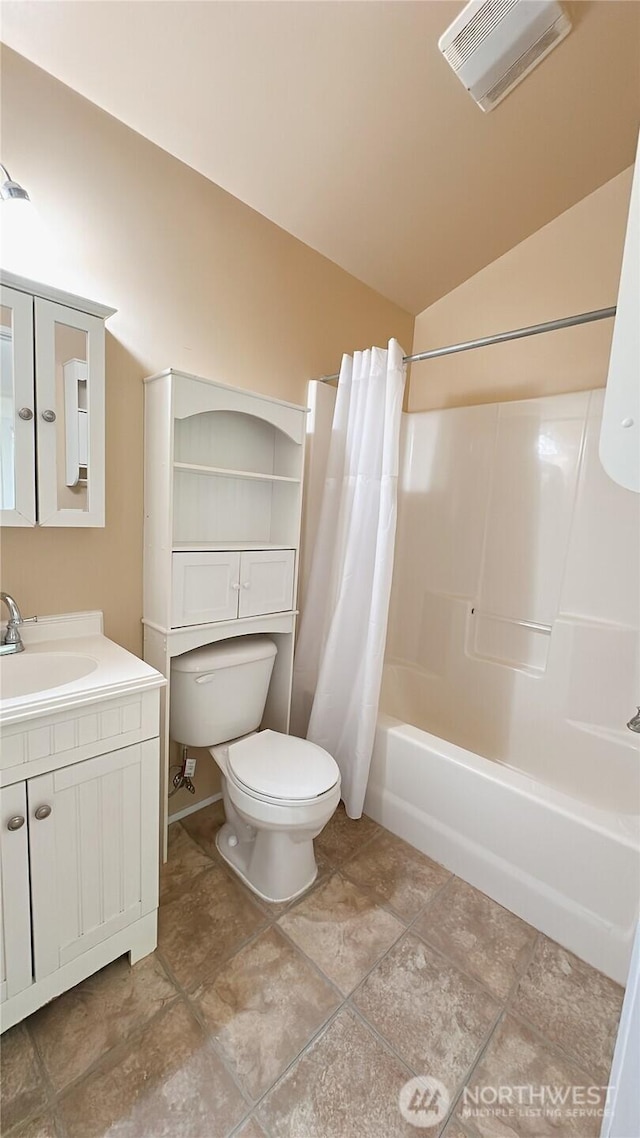 7459 Blaine Rd, Blaine, WA 98230 - full bath with toilet, vaulted ceiling, shower / tub combo with curtain, and vanity