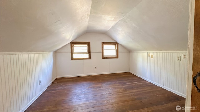 7459 Blaine Rd, Blaine, WA 98230 - bonus room with wood-type flooring, lofted ceiling, and baseboards