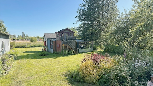 7459 Blaine Rd, Blaine, WA 98230 - view of grassy yard featuring stairs and a deck