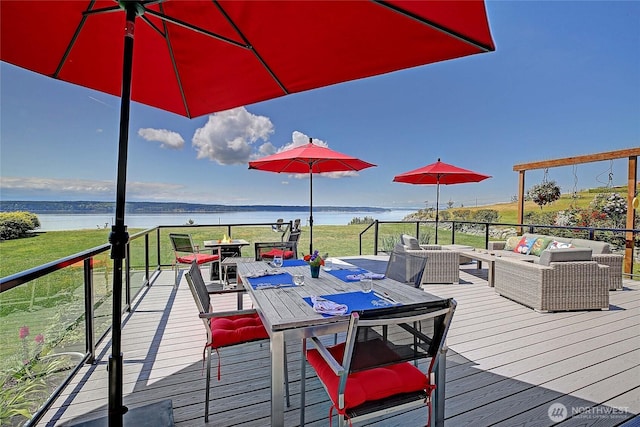 478 Eagle Crest Rd, Camano Island, WA 98282 - deck featuring outdoor lounge area, a water view, and outdoor dining space