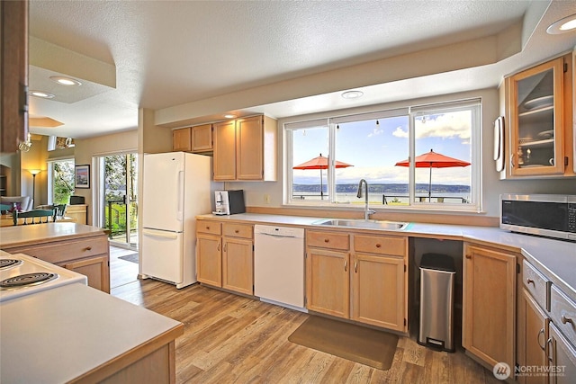 478 Eagle Crest Rd, Camano Island, WA 98282 - kitchen featuring white appliances, a sink, light wood-style floors, light countertops, and recessed lighting