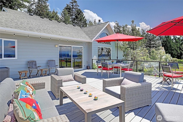 478 Eagle Crest Rd, Camano Island, WA 98282 - wooden terrace with outdoor dining space and an outdoor living space