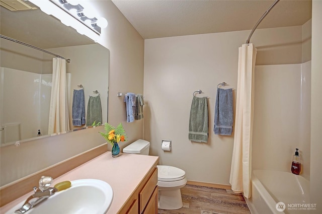 478 Eagle Crest Rd, Camano Island, WA 98282 - full bath with wood finished floors, vanity, shower / tub combo, toilet, and baseboards