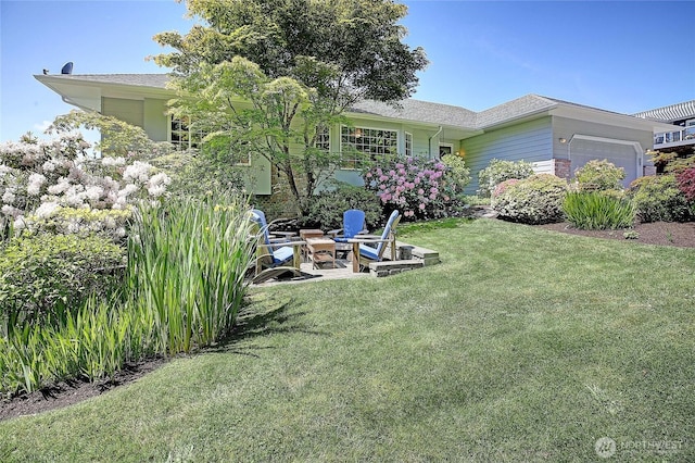 478 Eagle Crest Rd, Camano Island, WA 98282 - view of green lawn with a garage