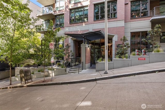 1420 Terry Ave Unit 1203, Seattle, WA 98101 - doorway to property featuring brick siding