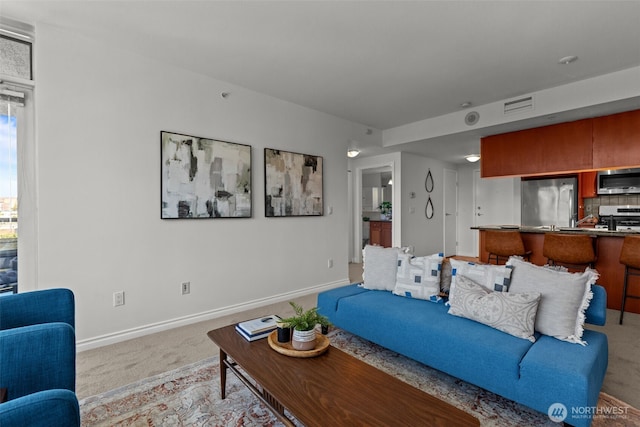 1420 Terry Ave Unit 1203, Seattle, WA 98101 - living room with light carpet and baseboards