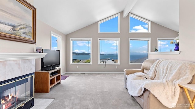 1042 Shorecrest Pl, Camano Island, WA 98282 - carpeted living room featuring a tile fireplace and healthy amount of natural light