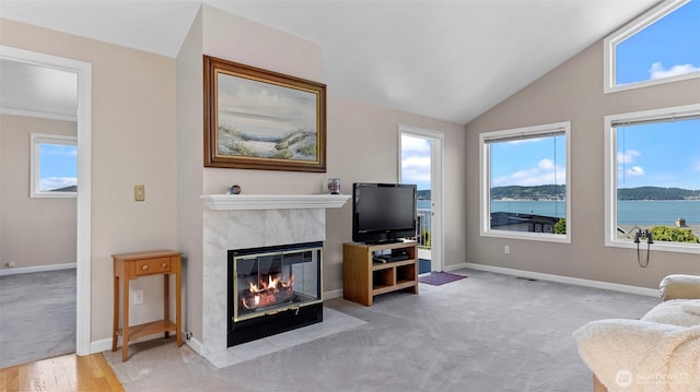 1042 Shorecrest Pl, Camano Island, WA 98282 - living area featuring a fireplace, carpet, and vaulted ceiling