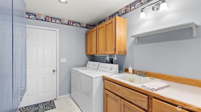 1042 Shorecrest Pl, Camano Island, WA 98282 - washroom with independent washer and dryer, cabinet space, and light floors