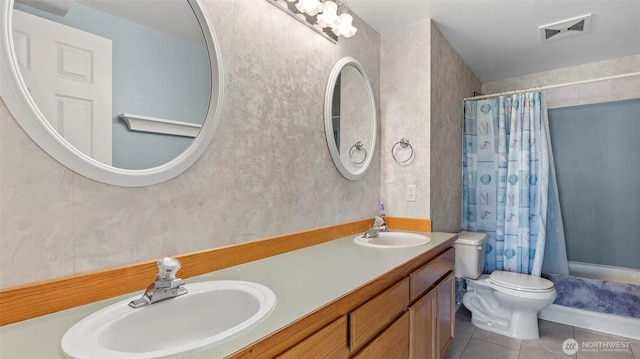 1042 Shorecrest Pl, Camano Island, WA 98282 - full bath with tile patterned floors, double vanity, and shower / bath combo