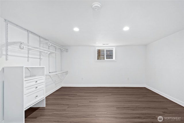 10056 Interlake Ave N, Seattle, WA 98133 - walk in closet featuring wood finished floors