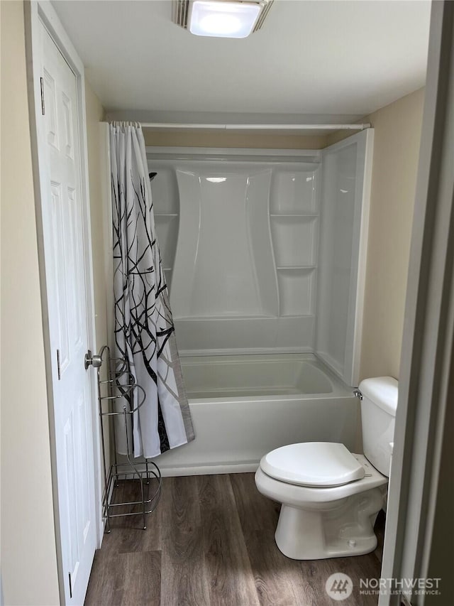30 G St, Forks, WA 98331 - bathroom with toilet, wood finished floors, and shower / tub combo with curtain