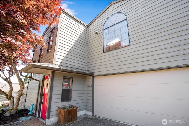 2715 Garfield Ave SE, Port Orchard, WA 98366 - view of side of home featuring a garage