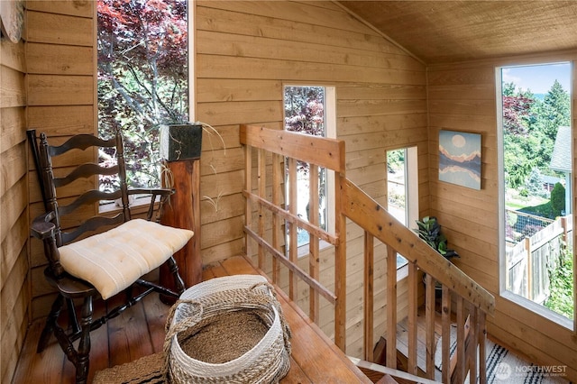 2715 Garfield Ave SE, Port Orchard, WA 98366 - staircase with wooden walls, healthy amount of natural light, wooden ceiling, and vaulted ceiling