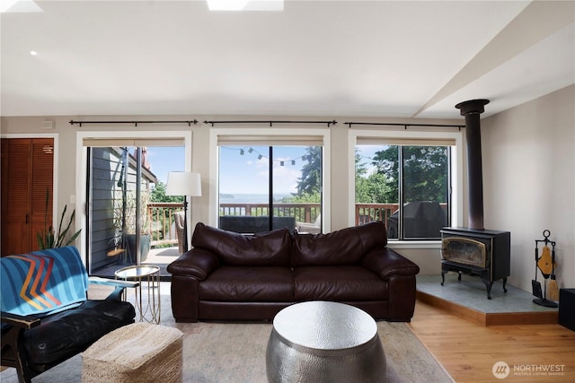 2715 Garfield Ave SE, Port Orchard, WA 98366 - living area featuring light wood-type flooring and a wood stove