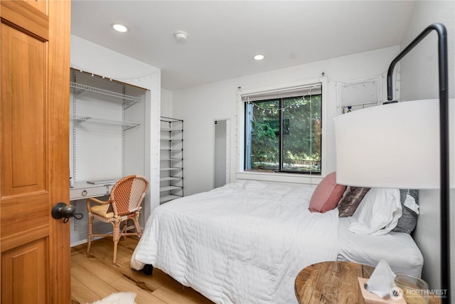2715 Garfield Ave SE, Port Orchard, WA 98366 - bedroom featuring light wood-type flooring, a closet, and recessed lighting