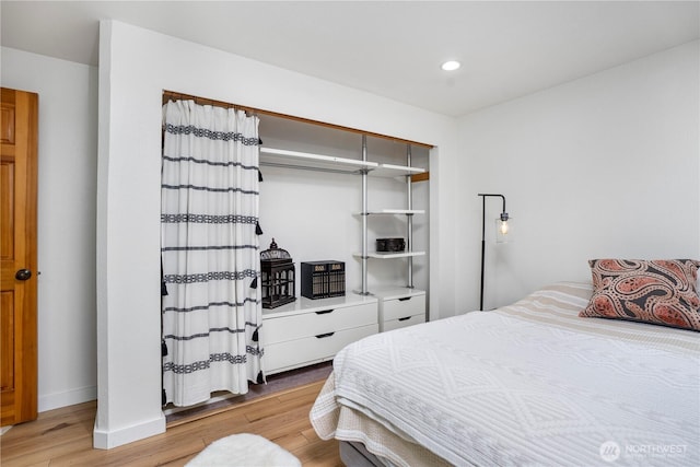 2715 Garfield Ave SE, Port Orchard, WA 98366 - bedroom featuring light wood-style floors, recessed lighting, and baseboards