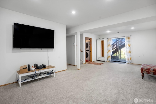2715 Garfield Ave SE, Port Orchard, WA 98366 - carpeted living room featuring stacked washer / drying machine, baseboards, and recessed lighting