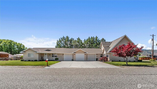 2509 Boston Ave NW, East Wenatchee, WA 98802 - view of front of house with an attached garage and driveway