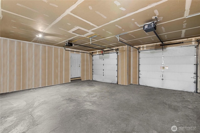 2509 Boston Ave NW, East Wenatchee, WA 98802 - garage featuring a garage door opener
