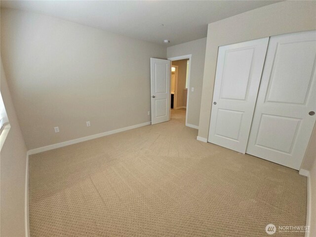 1901 78th Pl SE, Everett, WA 98203 - unfurnished bedroom with light carpet and a closet