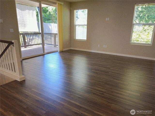 1901 78th Pl SE, Everett, WA 98203 - empty room with dark wood-type flooring and healthy amount of natural light