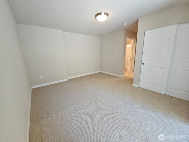 1901 78th Pl SE, Everett, WA 98203 - unfurnished bedroom featuring light carpet and a closet