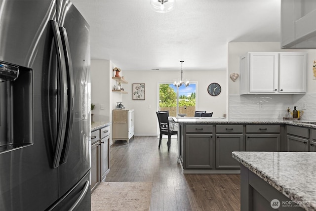 12524 SE 295th St, Auburn, WA 98092 - kitchen featuring stainless steel fridge, a chandelier, gray cabinetry, and dark wood-style floors