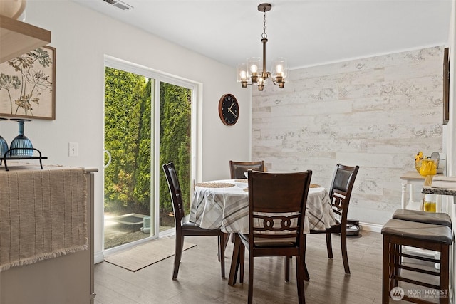 12524 SE 295th St, Auburn, WA 98092 - dining space featuring wood finished floors and a chandelier