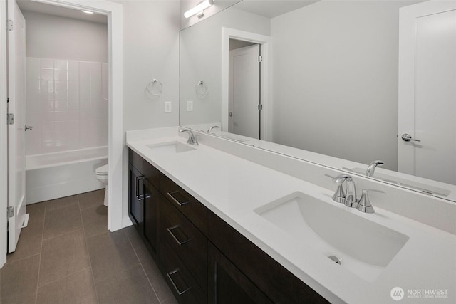 8026 131st Pl SE Unit 11, Snohomish, WA 98296 - full bathroom featuring double vanity, toilet, tile patterned floors, and shower / bathtub combination