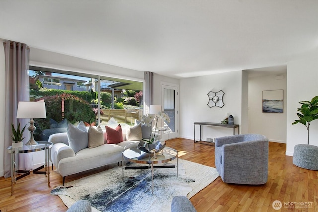 9030 6th Ave NW, Seattle, WA 98117 - living room with wood finished floors and baseboards