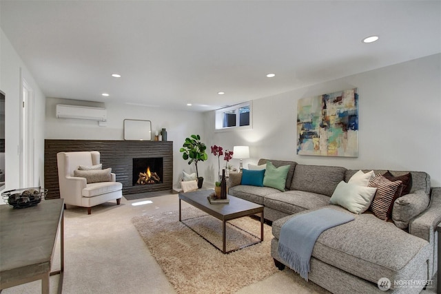 9030 6th Ave NW, Seattle, WA 98117 - living room with recessed lighting, a wall unit AC, carpet flooring, and a fireplace