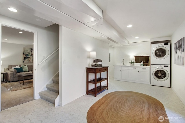 9030 6th Ave NW, Seattle, WA 98117 - washroom with stacked washer / drying machine, recessed lighting, baseboards, and light carpet