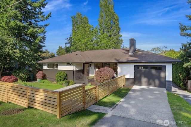 9030 6th Ave NW, Seattle, WA 98117 - view of front of house featuring asphalt driveway, a chimney, a garage, brick siding, and a shingled roof