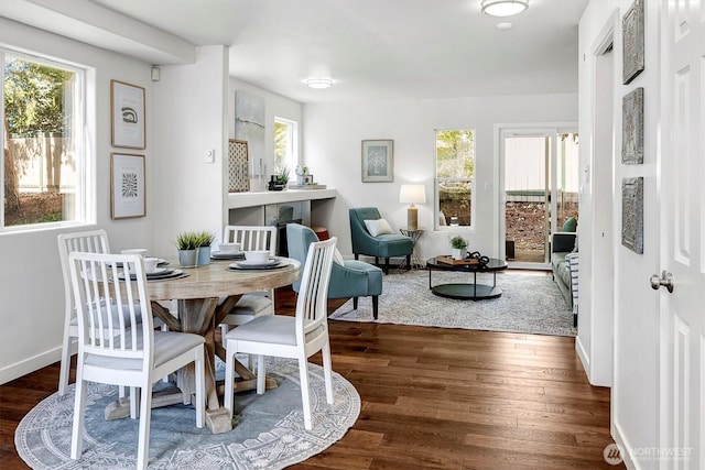 6128 202nd St SW Unit 101, Lynnwood, WA 98036 - dining area featuring wood finished floors