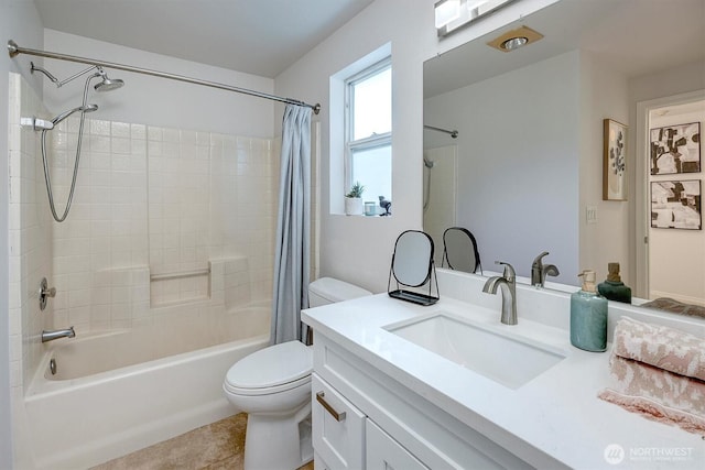 6128 202nd St SW Unit 101, Lynnwood, WA 98036 - full bath with shower / bath combo with shower curtain, vanity, and tile patterned flooring