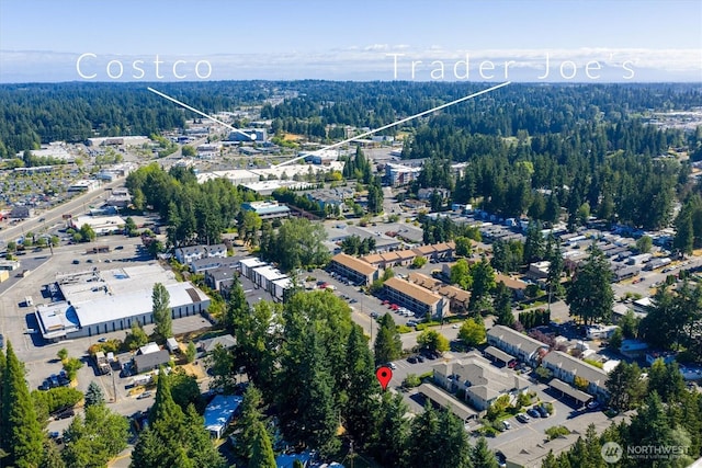 6128 202nd St SW Unit 101, Lynnwood, WA 98036 - view of property location with a forest