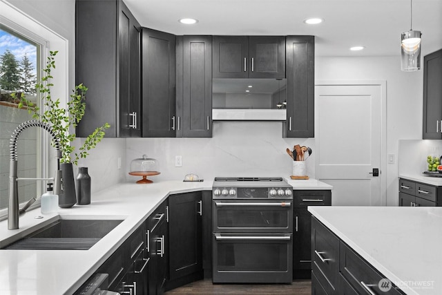 16100 SE 113th Pl, Renton, WA 98059 - kitchen with range, a sink, extractor fan, light countertops, and backsplash