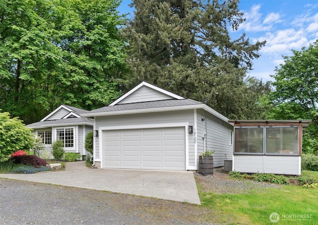 16100 SE 113th Pl, Renton, WA 98059 - single story home with driveway, an attached garage, and a sunroom